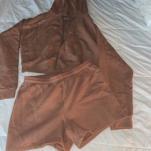 Brown cropped hoodie and sweat shorts to match .